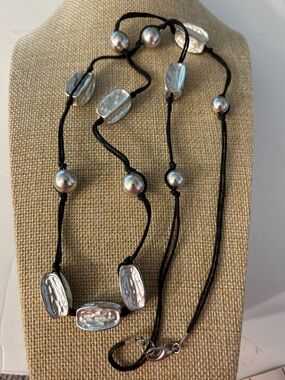 Chunky silvertone Long Black Corded Necklace with interesting shaped beads